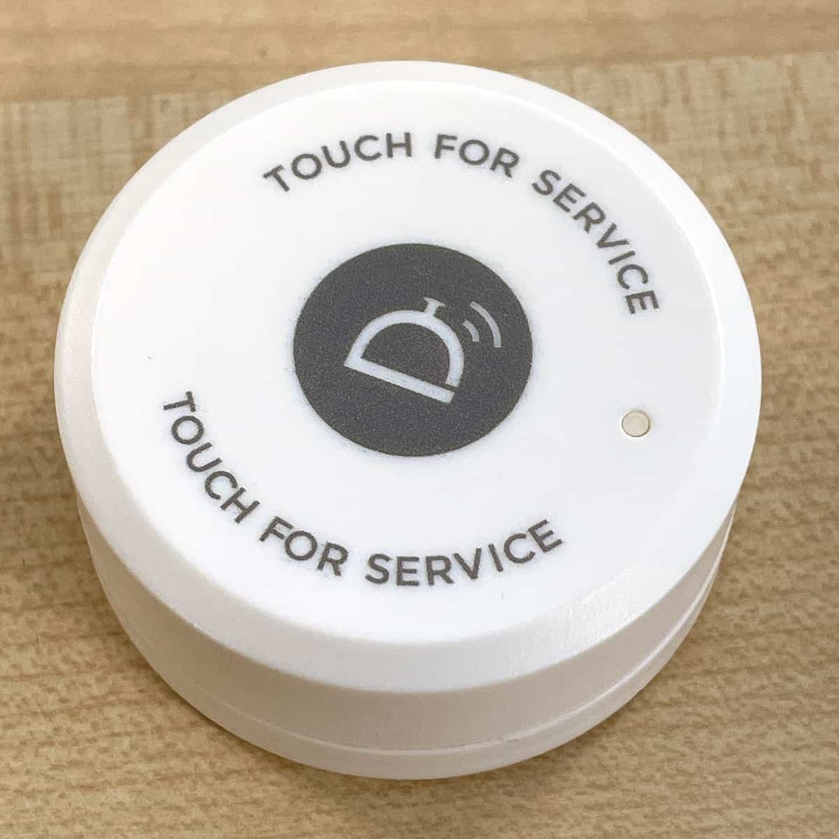 white branded call button